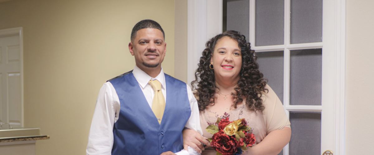 anniversary couple photo near French doors