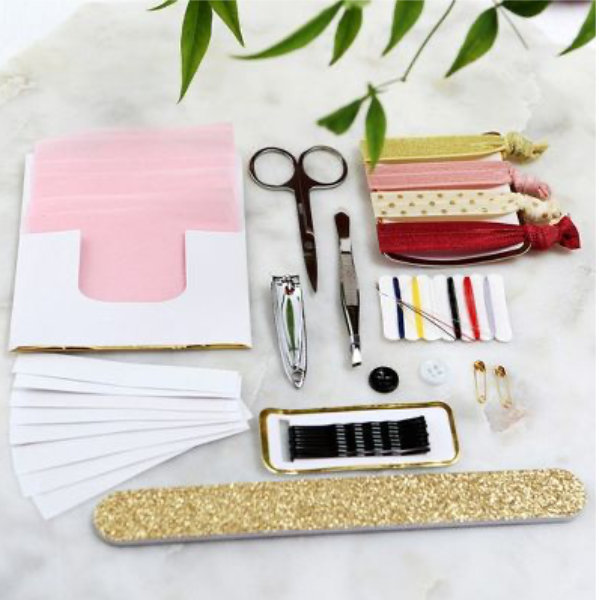 wedding survival kit with sewing thread, hair and nail accessories, and scissors