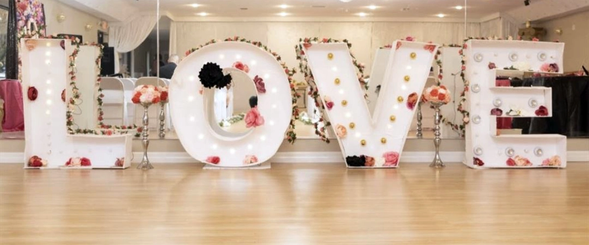 love statue on venue mirror wall